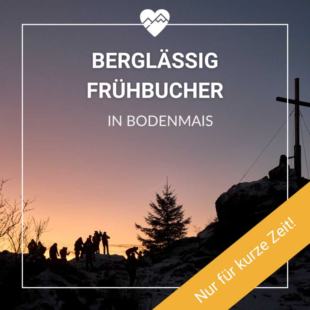 Silhouetten von Menschen auf einem Berg bei Sonnenuntergang mit deutschem Text &uuml;ber Fr&uuml;hbucher in Bodenmais.